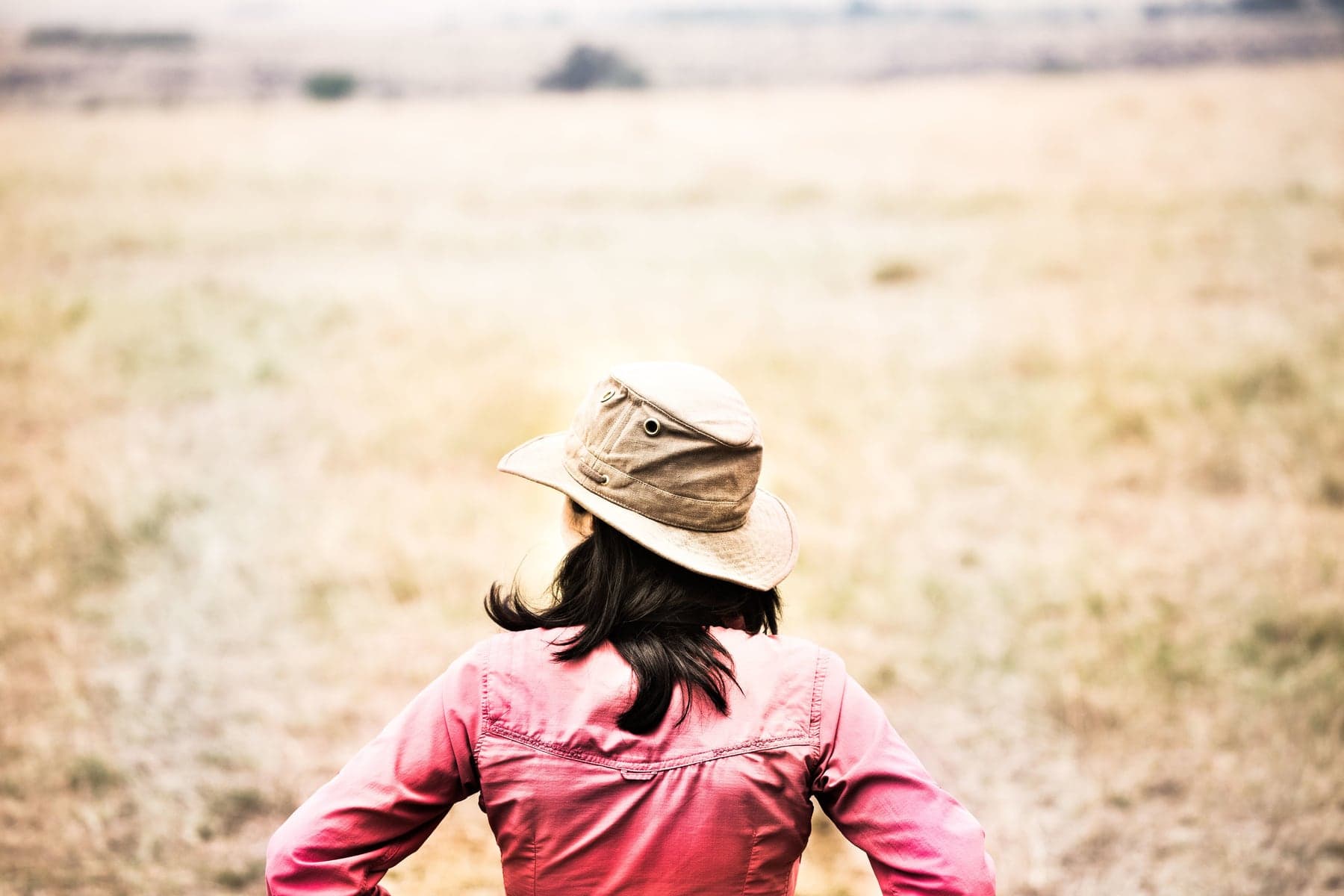 Traveler looking across an African landscape