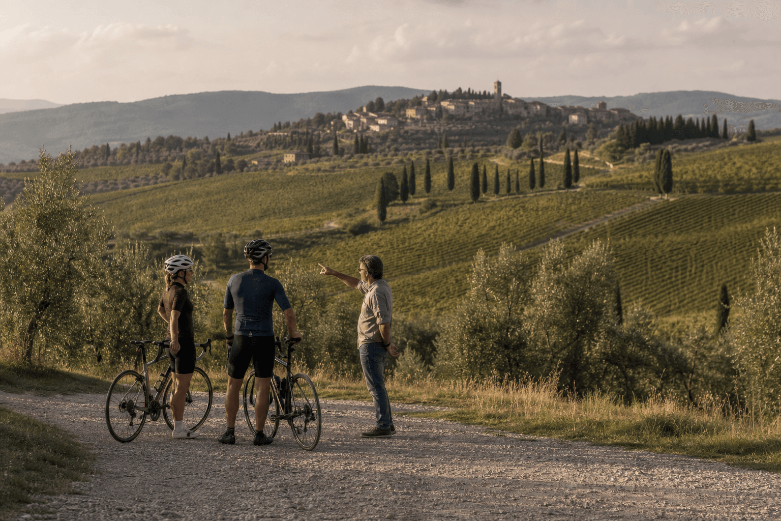 Cyclists resting beside rows of Tuscan vines